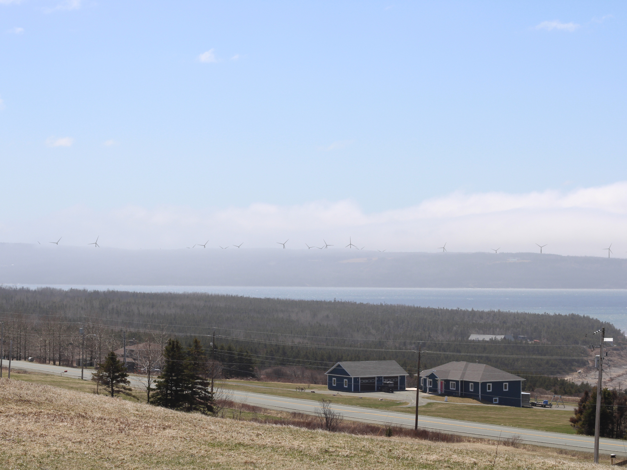 A photo simulation of the visual impact of the project when looking southwest across the Strait of Canso toward the site from Long Point.